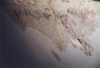 Renesanční freska po částečném odkrytí vápenné krusty